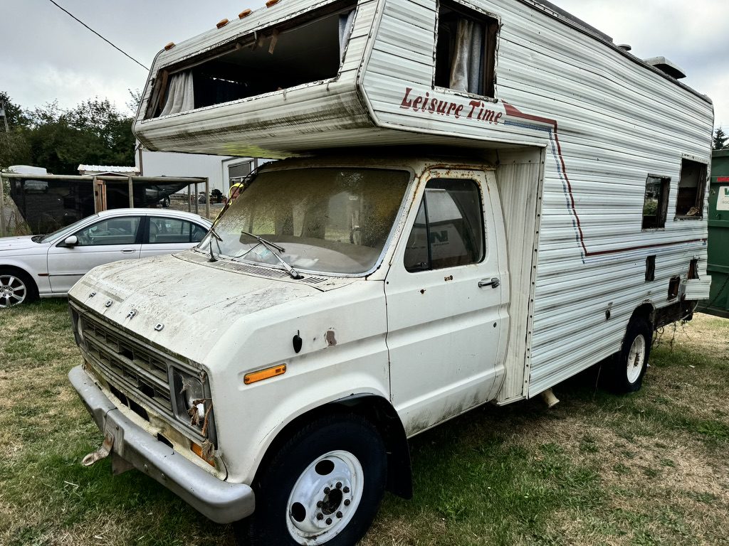 Worn 1970s motorhome ready for professional RV demolition in Portland