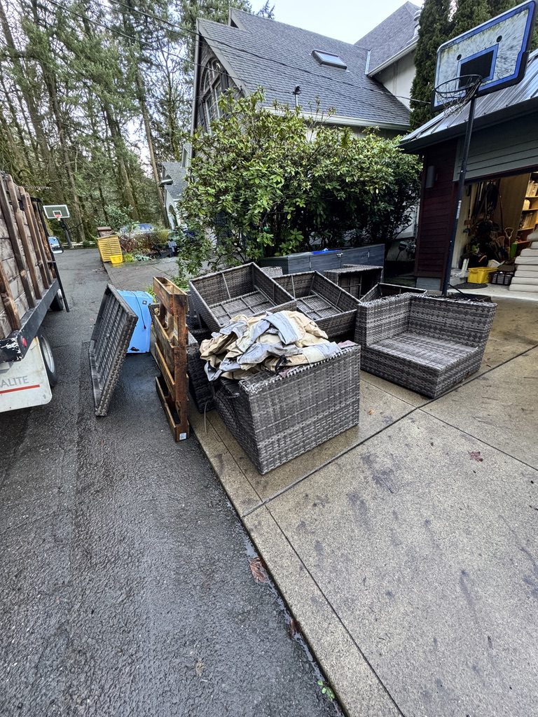Old patio furniture being removed from backyard in SW Portland